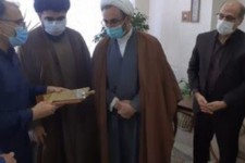 تندیس ملی فداکاری به خانواده دو شهید مدافع سلامت در ایلام اعطا شد